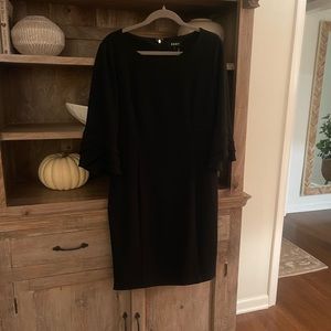 DKNY black open sleeve cocktail dress. Large